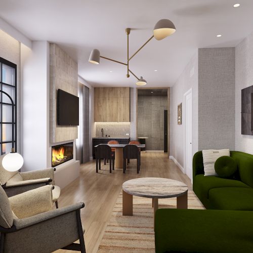 The image shows a modern living room with a green sofa, a fireplace, stylish lighting, and a dining area in the background.