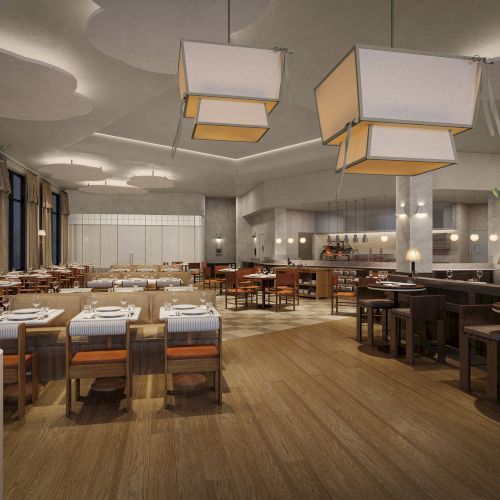 A modern restaurant interior with wooden flooring, elegant lighting, and neatly set tables and chairs, creating a cozy, welcoming ambiance.