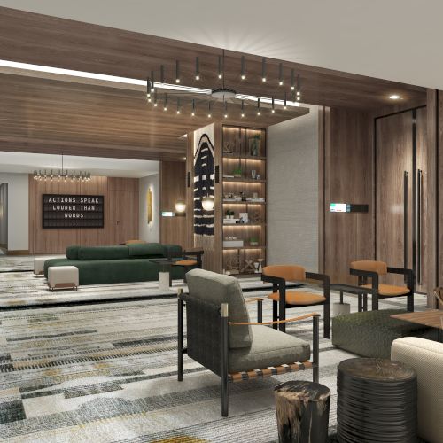 The image shows a modern, stylish lounge area with seating, a wooden ceiling, decorative shelves, and a patterned rug.