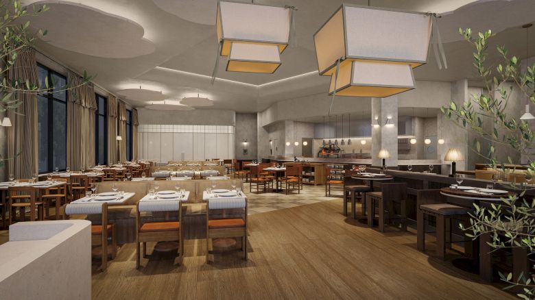 The image shows a modern, spacious restaurant interior with wooden flooring, large square lights, and neatly arranged tables and chairs.